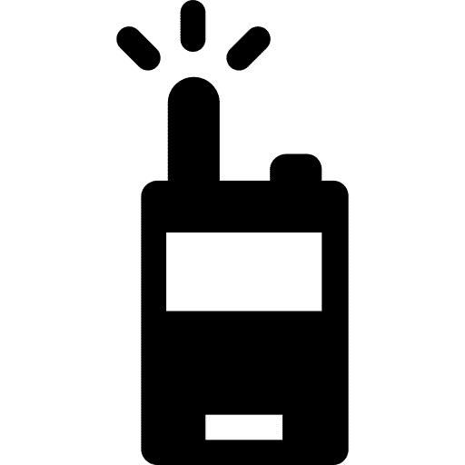 Une icône représentant un talkie-walkie noir en flat design.